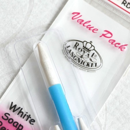 White soap stone holder and pencils close-up