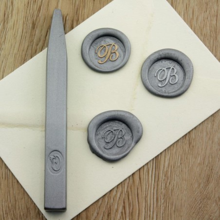Metallic silver wax seal impression on envelope