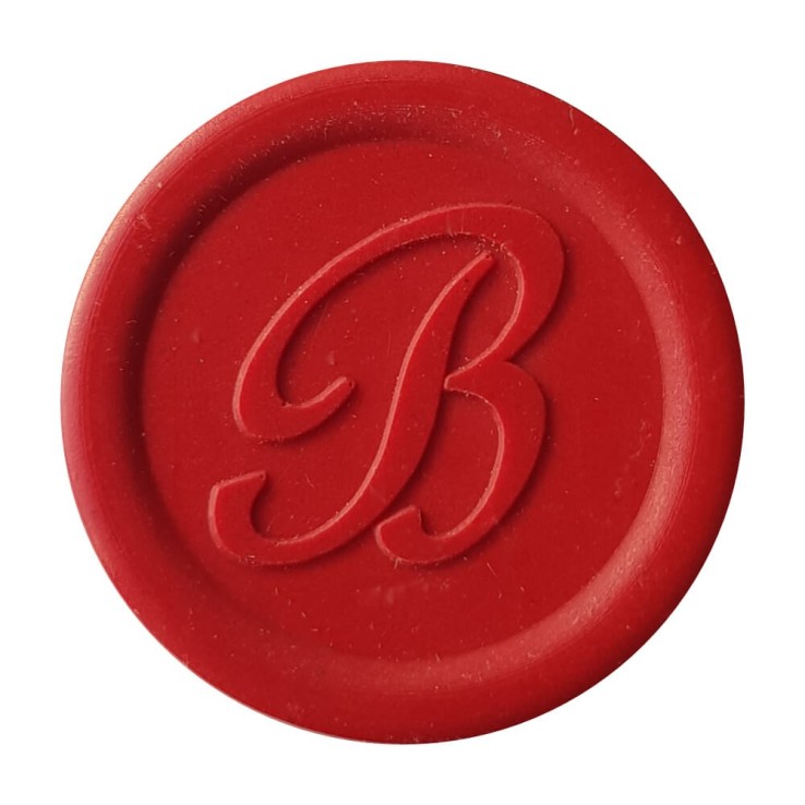 Decorative light red wax seal created with Bortoletti sealing wax