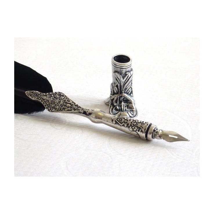 Close-up of black feather pen and pewter quill by La Kaligrafica