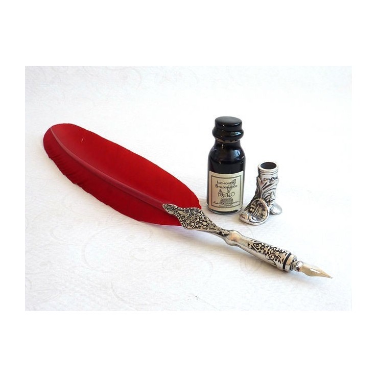 Close-up of red feather pen and pewter quill by La Kaligrafica