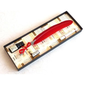 Close-up of red feather pen and pewter quill by La Kaligrafica 2